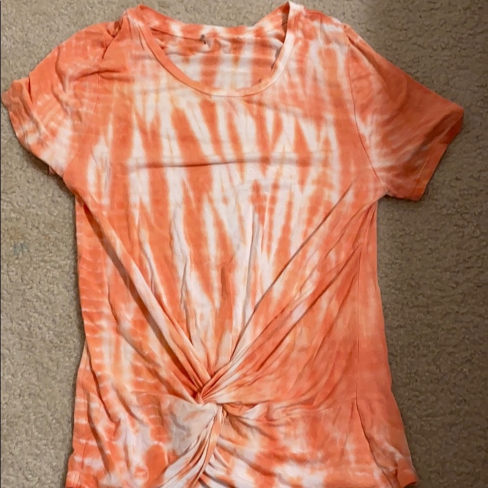orange and white tye dye shirt